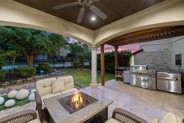 11913 Preserve Vista Ter, Austin, TX 78738 - fenced backyard featuring a patio, a ceiling fan, and an outdoor fire pit
