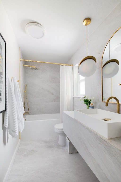 2608 Coatbridge Dr, Austin, TX 78745 - bathroom with shower / tub combo and vanity