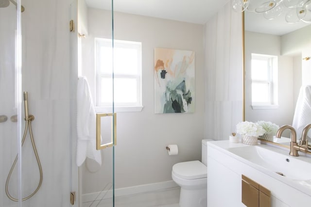 2608 Coatbridge Dr, Austin, TX 78745 - bathroom featuring a shower with shower door, vanity, and a chandelier