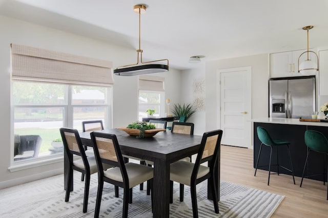 2608 Coatbridge Dr, Austin, TX 78745 - dining room featuring light wood-style flooring