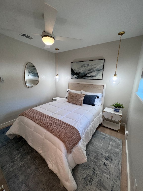 2608 Coatbridge Dr, Austin, TX 78745 - bedroom with baseboards and a ceiling fan
