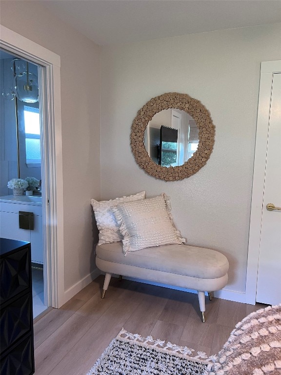 2608 Coatbridge Dr, Austin, TX 78745 - sitting room with wood finished floors and baseboards