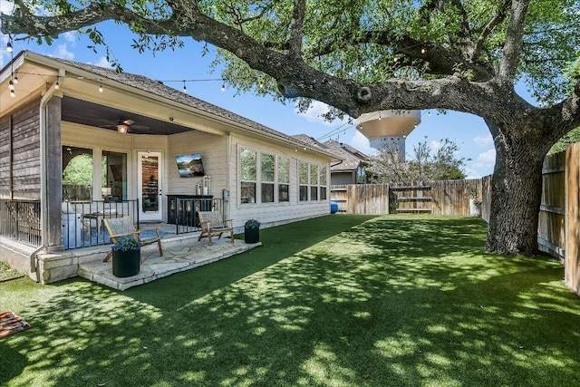340 Fort Cobb Way, Georgetown, TX 78628 - rear view of house with a ceiling fan, a fenced backyard, and a patio