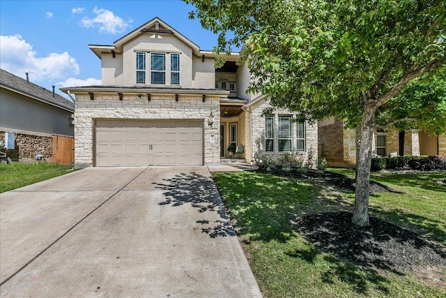 340 Fort Cobb Way, Georgetown, TX 78628 - view of front of property with stone siding, stucco siding, a garage, driveway, and a front yard