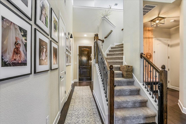 340 Fort Cobb Way, Georgetown, TX 78628 - stairway featuring baseboards and wood finished floors