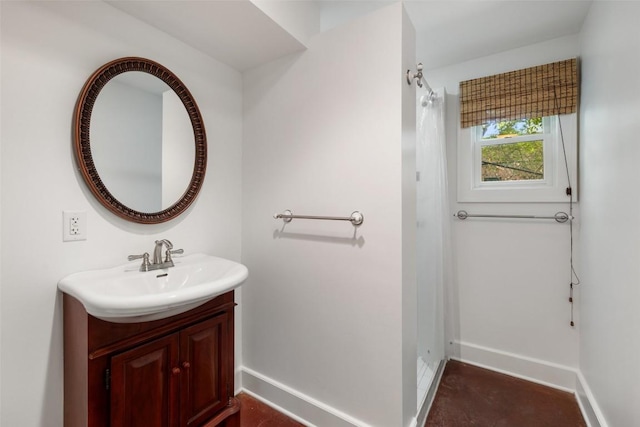 1114 Reagan Ter, Austin, TX 78704 - full bathroom with baseboards and vanity