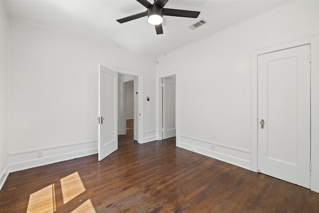 1114 Reagan Ter, Austin, TX 78704 - unfurnished room featuring a ceiling fan, wood finished floors, baseboards, and crown molding