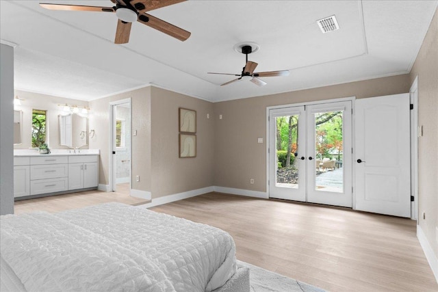 bedroom with access to outside, baseboards, light wood-type flooring, french doors, and visible vents
