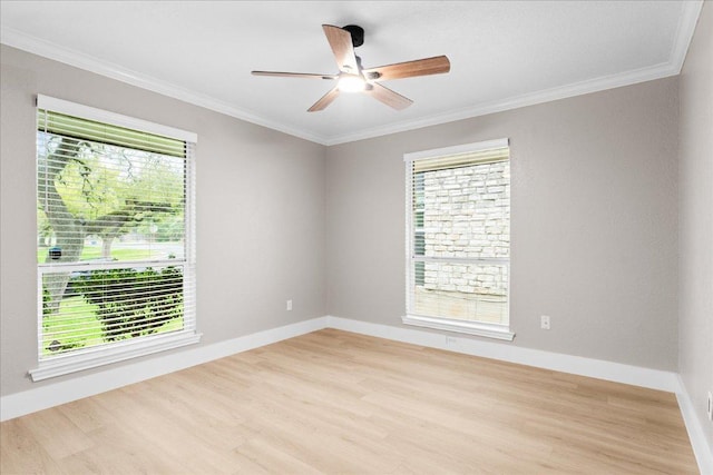 10616 Spicewood Pkwy, Austin, TX 78750 - empty room with wood finished floors, a ceiling fan, ornamental molding, and baseboards