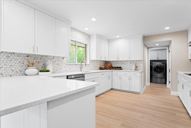 kitchen with light wood-style flooring, white cabinetry, and recessed lighting