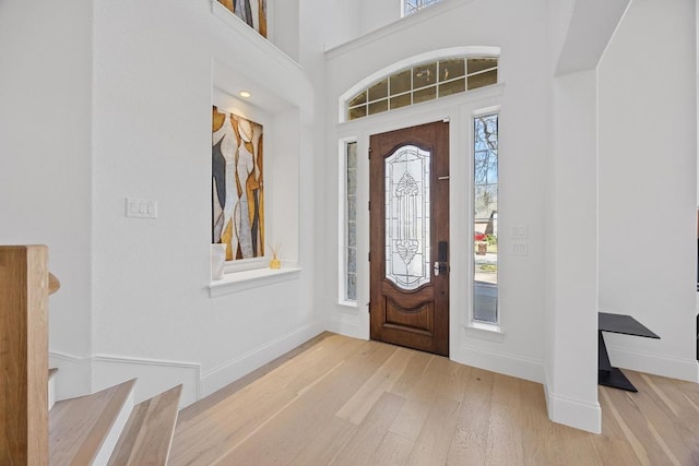 1409 Vibar Cv, Round Rock, TX 78681 - entryway with wood finished floors and stairs