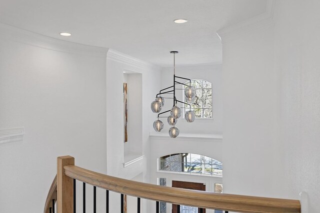 1409 Vibar Cv, Round Rock, TX 78681 - detailed view of a chandelier, crown molding, and recessed lighting
