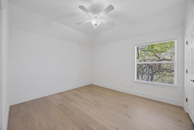 1409 Vibar Cv, Round Rock, TX 78681 - spare room featuring light wood-style floors and ceiling fan