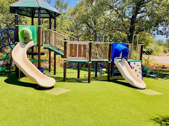 1409 Vibar Cv, Round Rock, TX 78681 - communal playground with a lawn