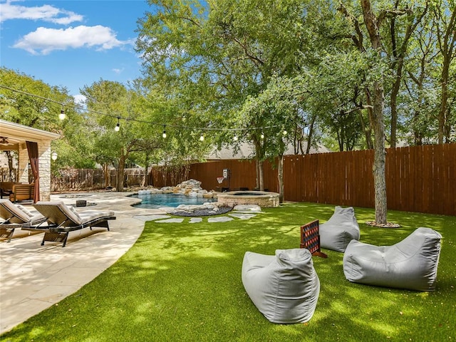 1409 Vibar Cv, Round Rock, TX 78681 - fenced backyard with a patio area and a pool with connected hot tub