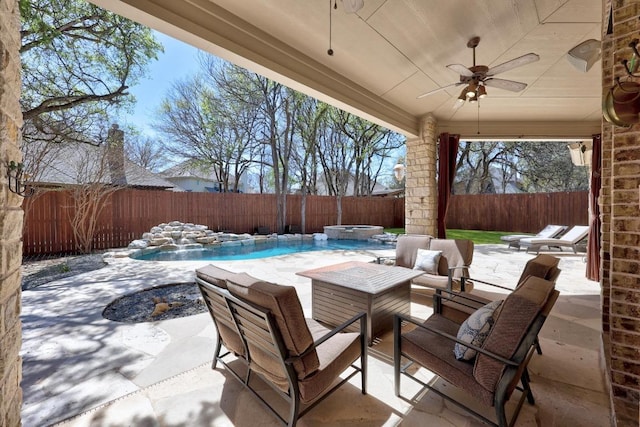 1409 Vibar Cv, Round Rock, TX 78681 - fenced backyard featuring ceiling fan, a patio, and a pool with connected hot tub