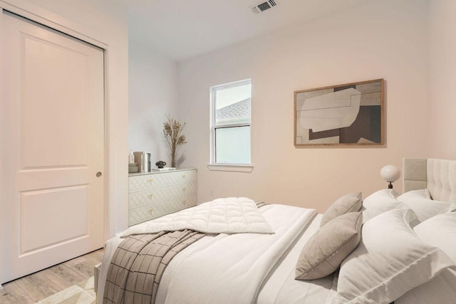 300 Alava Way, Georgetown, TX 78628 - bedroom featuring light wood-type flooring and a closet