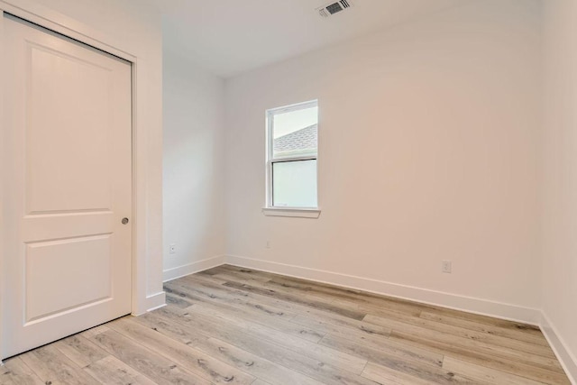 300 Alava Way, Georgetown, TX 78628 - unfurnished bedroom featuring light wood-style flooring, baseboards, and a closet