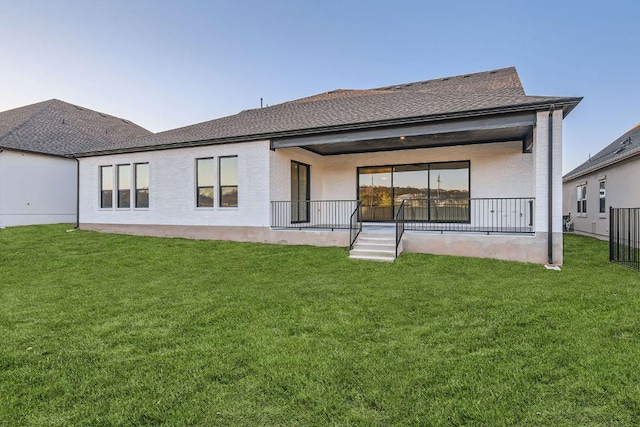 300 Alava Way, Georgetown, TX 78628 - back of house featuring brick siding, a yard, and a porch