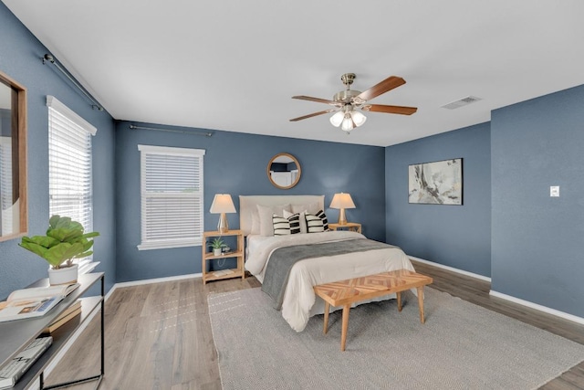 1114 Sussex Pl, Round Rock, TX 78665 - bedroom featuring wood finished floors and ceiling fan