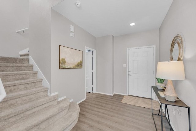 1114 Sussex Pl, Round Rock, TX 78665 - foyer entrance featuring stairway, wood finished floors, and recessed lighting