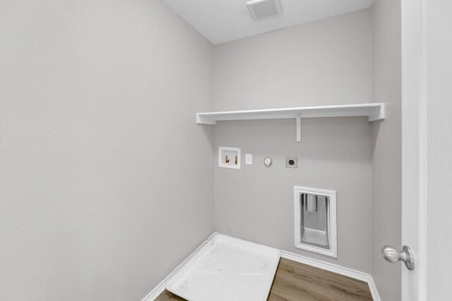 laundry area featuring visible vents, washer hookup, hookup for a gas dryer, laundry area, and electric dryer hookup