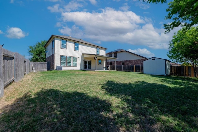 1114 Sussex Pl, Round Rock, TX 78665 - rear view of house featuring a shed and a fenced backyard