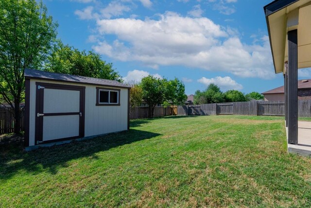1114 Sussex Pl, Round Rock, TX 78665 - fenced backyard with a storage shed
