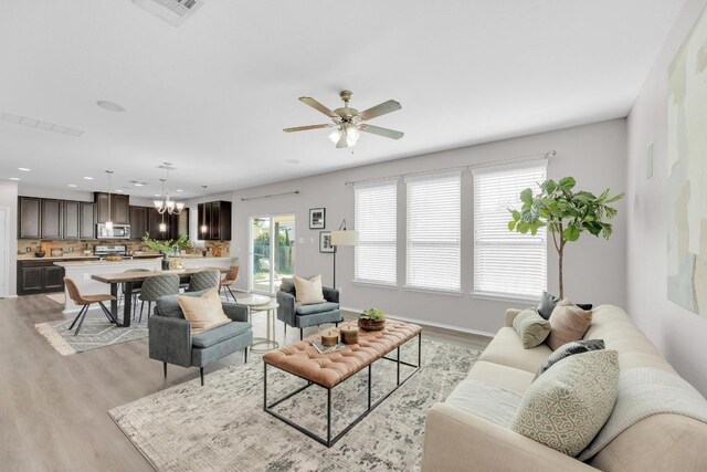1114 Sussex Pl, Round Rock, TX 78665 - living room featuring light wood finished floors, ceiling fan, and recessed lighting