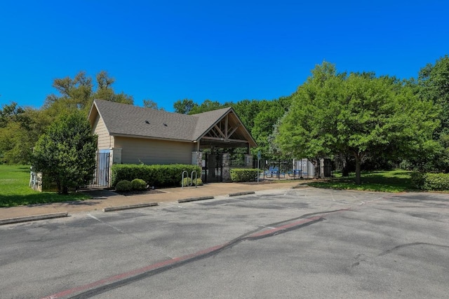 1114 Sussex Pl, Round Rock, TX 78665 - view of front of home with a gate and uncovered parking
