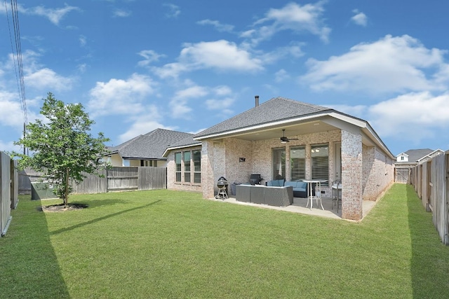 2831 Tanager Trce, Katy, TX 77493 - back of house featuring ceiling fan, an outdoor living space, a fenced backyard, a patio, and brick siding
