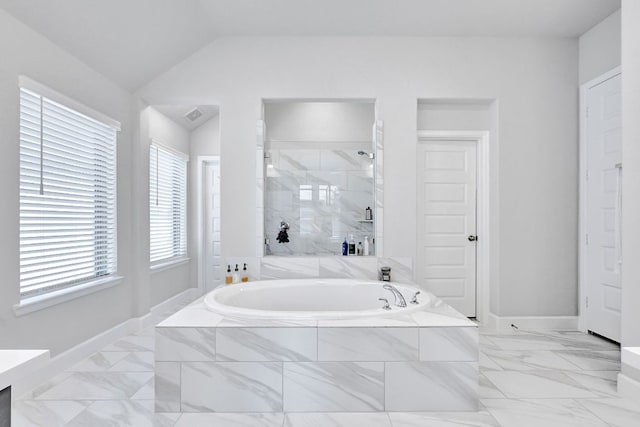 2831 Tanager Trce, Katy, TX 77493 - bathroom featuring a bath, a walk in shower, marble look tile flooring, lofted ceiling, and vanity