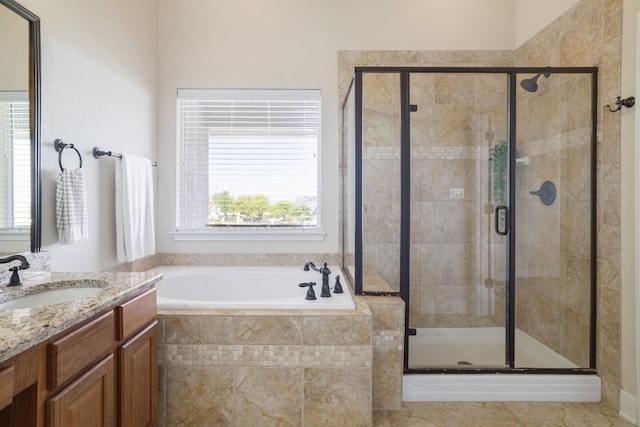 103 Aria Rdg Unit 902, Austin, TX 78738 - bathroom with a bath, vanity, and a stall shower