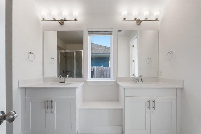105 Lemuel Crawford Trl, Bastrop, TX 78602 - full bathroom with a sink, two vanities, and a stall shower