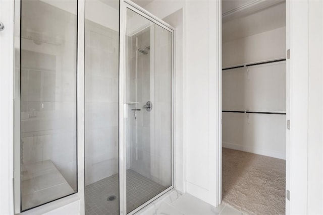 105 Lemuel Crawford Trl, Bastrop, TX 78602 - full bathroom with a shower stall and a spacious closet