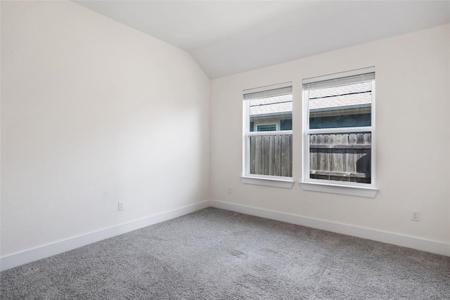 105 Lemuel Crawford Trl, Bastrop, TX 78602 - empty room with baseboards, lofted ceiling, and carpet floors