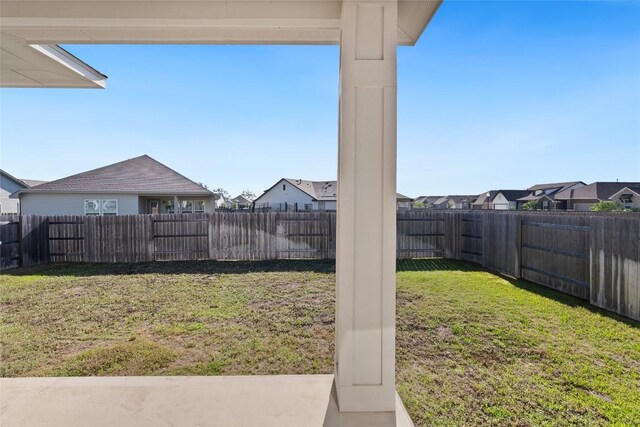 105 Lemuel Crawford Trl, Bastrop, TX 78602 - view of yard featuring a fenced backyard and a residential view