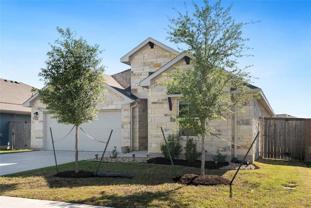 105 Lemuel Crawford Trl, Bastrop, TX 78602 - view of front of property featuring a front yard, stone siding, a garage, fence, and concrete driveway