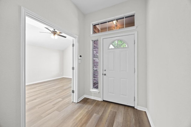806 Broken Trace Ct, Round Rock, TX 78665 - foyer featuring wood finished floors, baseboards, and a ceiling fan