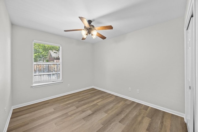 806 Broken Trace Ct, Round Rock, TX 78665 - unfurnished room featuring a ceiling fan, wood finished floors, and baseboards