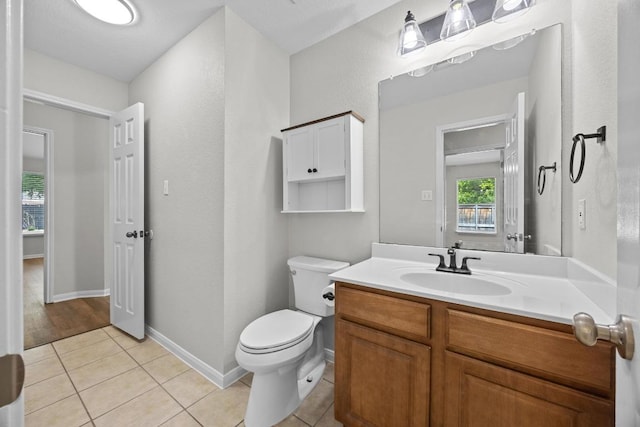 806 Broken Trace Ct, Round Rock, TX 78665 - bathroom featuring vanity, tile patterned floors, and toilet