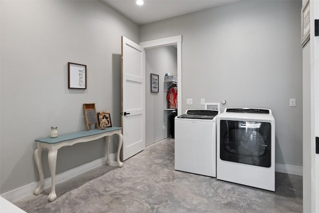 468 Cedar Mountain Dr, Marble Falls, TX 78654 - laundry room featuring washing machine and dryer and baseboards