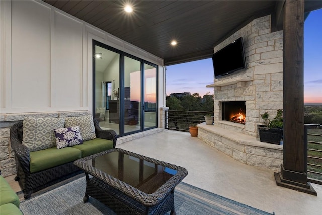 468 Cedar Mountain Dr, Marble Falls, TX 78654 - view of patio / terrace with an outdoor stone fireplace