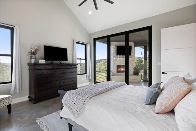 468 Cedar Mountain Dr, Marble Falls, TX 78654 - bedroom featuring access to exterior, concrete flooring, multiple windows, high vaulted ceiling, and recessed lighting