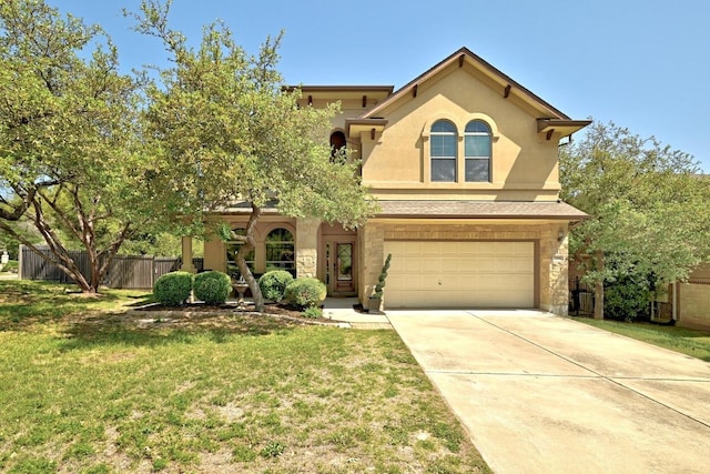 21940 Agarito Ln, Spicewood, TX 78669 - view of front of house with stone siding, an attached garage, driveway, and stucco siding