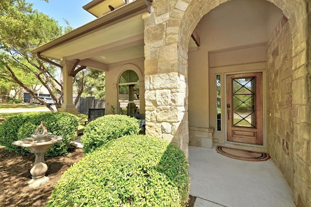 21940 Agarito Ln, Spicewood, TX 78669 - view of exterior entry with stone siding