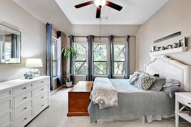 21940 Agarito Ln, Spicewood, TX 78669 - bedroom featuring lofted ceiling, light carpet, and a ceiling fan