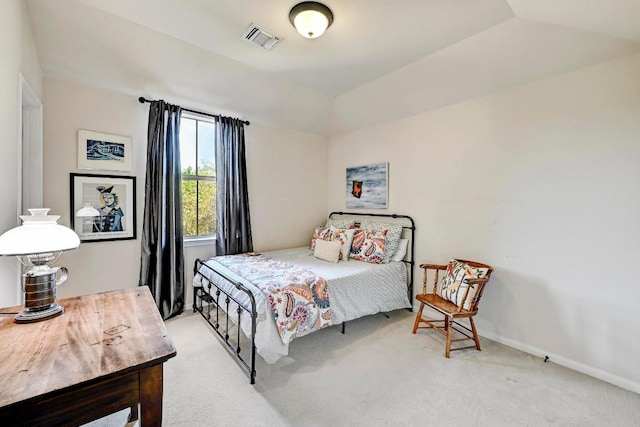 21940 Agarito Ln, Spicewood, TX 78669 - bedroom featuring light colored carpet, baseboards, and vaulted ceiling