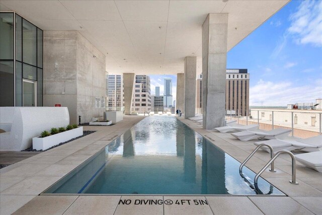 313 W 17th St Unit 2403, Austin, TX 78701 - community pool featuring a patio area