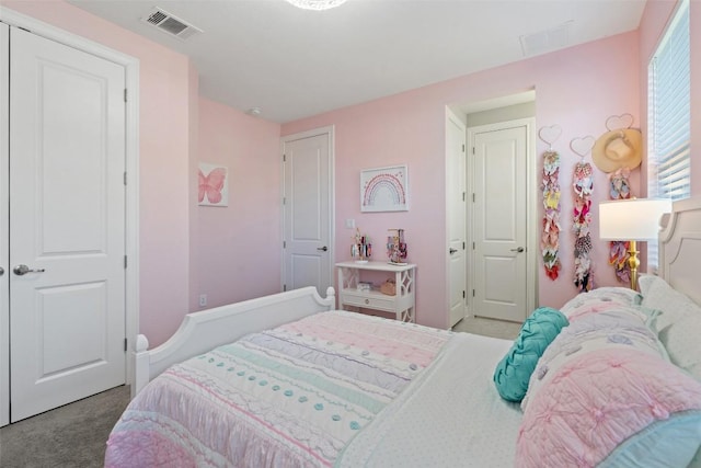 bedroom with carpet floors and baseboards